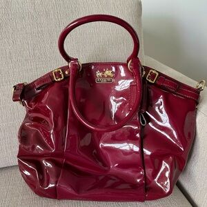 Coach purse with long shoulder strap included. Beautiful cranberry colour.